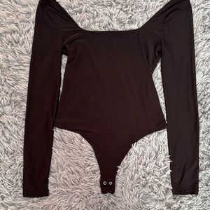Elegant Black Long Sleeve Fitted Bodysuit